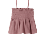 Pink smocked camisole top with thin straps, made from a textured, crinkled fabric.