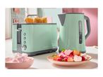 Mint green SilverCrest toaster and kettle with toast, fruit, and marshmallows.
