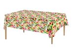 Table with a tropical floral tablecloth featuring red, pink, and yellow hibiscus flowers and green leaves.