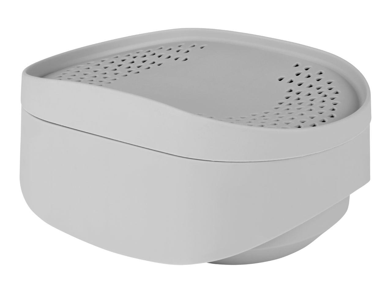 Light gray, curved plastic container with a perforated lid, angled view.
