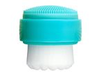 A teal silicone facial cleansing brush with a soft bristle head.