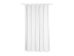 White waffle weave shower curtain hanging from a silver rod with rings