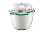 Glasbeholder med fåremælksyoghurt, pyntet med grøn kant og snor, med etiket, der viser næringsindhold og vægt på 530g.