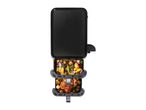 A vertical, two-tiered food warmer with a black cover, displaying cooked meats and vegetables.