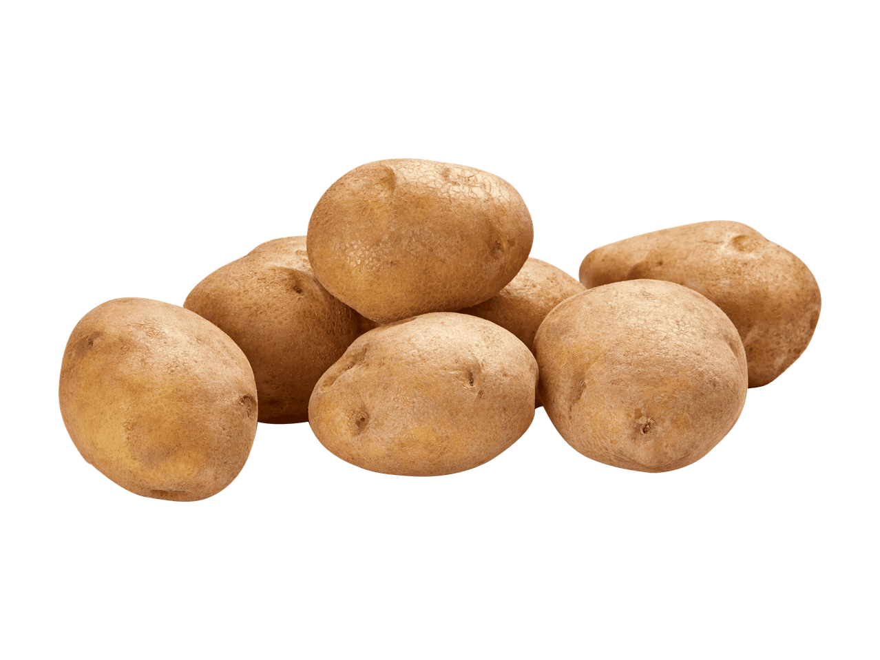 Un tas de pommes de terre brunes sur fond noir.