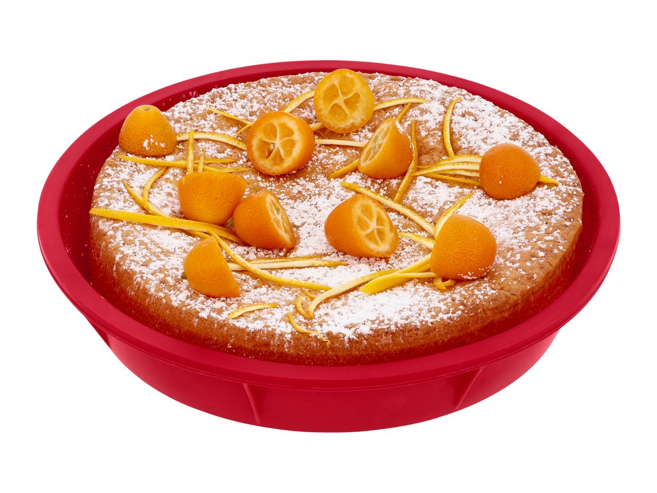 Round cake with powdered sugar, kumquats, and orange zest in a red silicone mold.