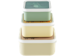 Stacked LIVARNO home lunch boxes with animal designs, including a crocodile.