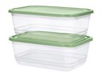 Two rectangular clear food storage containers with light green lids, stacked on top of each other.