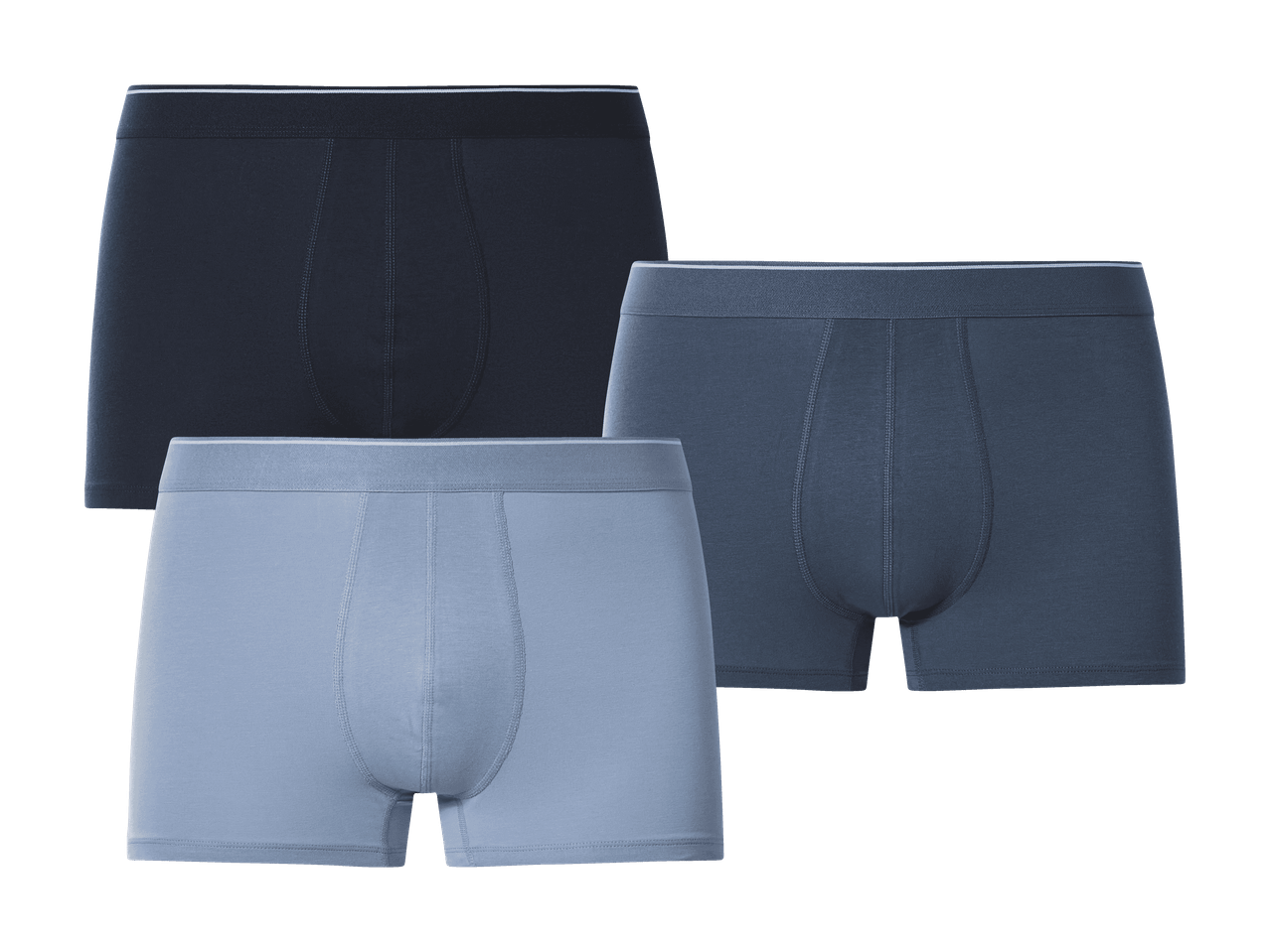 Tre par herreboxershorts i mørkeblå, blå og lyseblå.