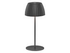A modern, dark gray table lamp with a pleated shade and a slender stand.