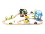 Wooden toy train set with a Halloween theme, including a haunted house, Ferris wheel, and cars.