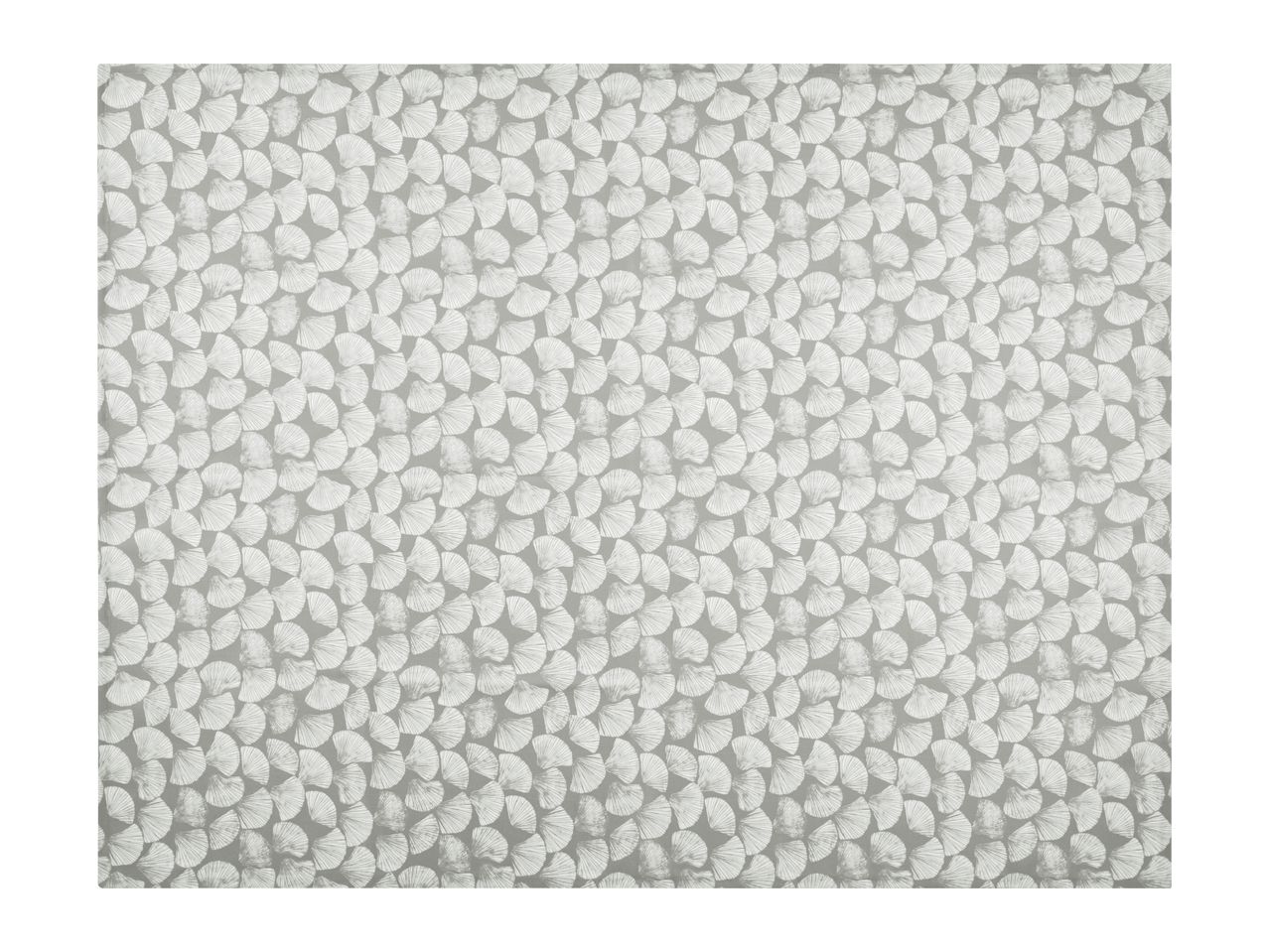 Grey placemat with a repeating pattern of white ginkgo leaf shapes.