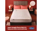 A Silentnight heated underblanket with super snuggly fleece fabric is shown on a bed in a cozy bedroom setting.