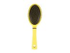 A yellow hairbrush with black bristles is shown against a white background.
