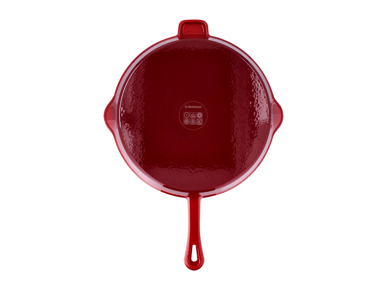 Red SilverCrest cast iron pan with a handle and two side grips, viewed from the bottom.