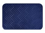 Blue rectangular bath mat with a herringbone pattern
