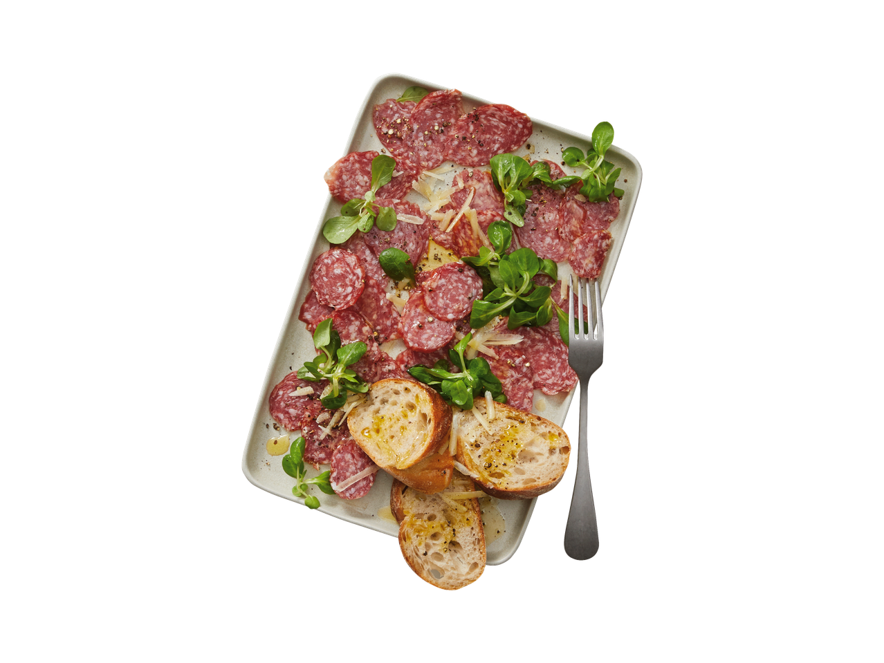 Italiamo Strolghino Pork Salami with bread, cheese, and greens on a platter