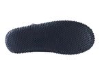 Bottom view of a dark blue flip-flop with a textured, studded sole.