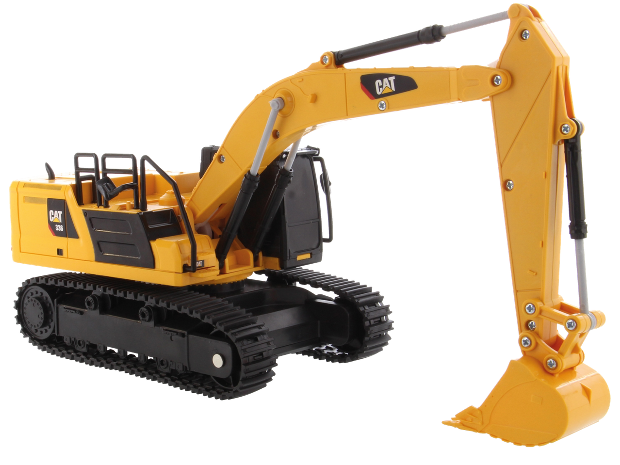 Geltonas CAT 336 žaislinis ekskavatorius juodame fone.