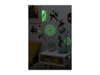 Glow-in-the-dark Spider-Man wall decals decorate a child's bedroom.