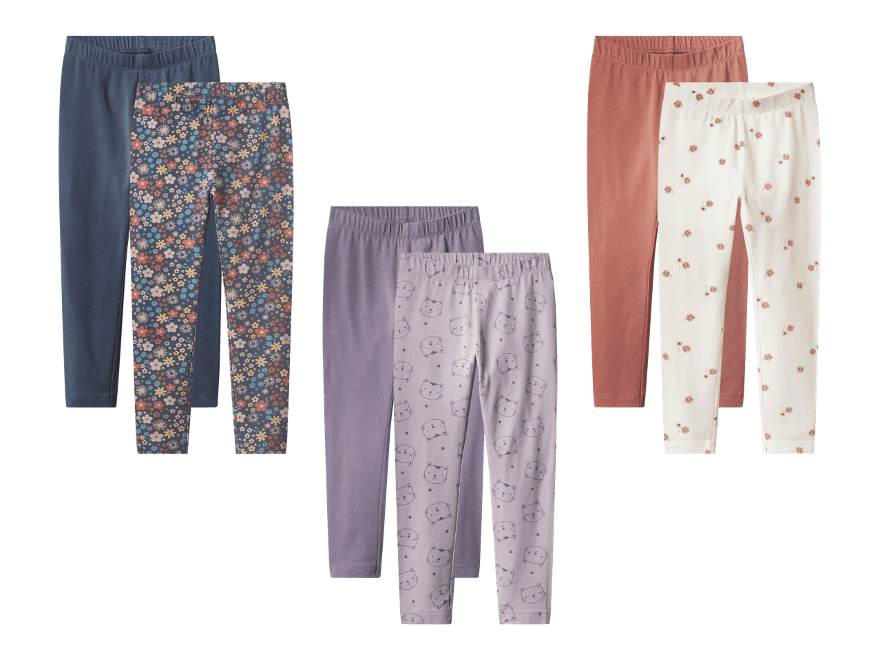 Kolme paria lasten leggingsejä: siniset kukkaprintillä, violetit kissaprintillä ja valkoiset kukkakuvioilla.