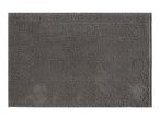 A gray bath mat with a textured surface.