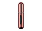 Rose gold refillable perfume atomizer.