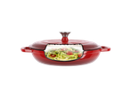 Oală roșie din fontă cu paste de dovlecei și roșii în interior