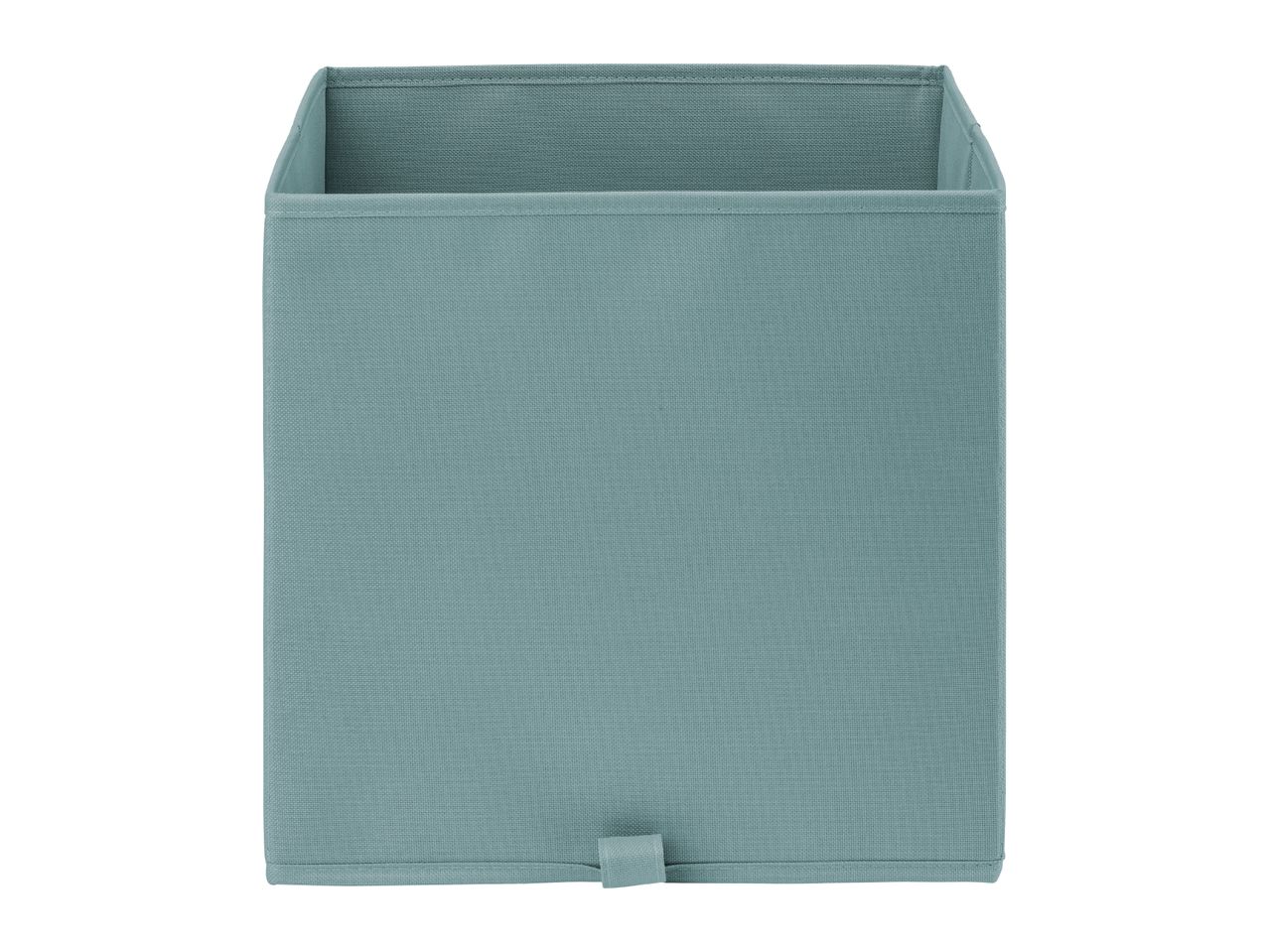 A teal fabric storage box with a small loop handle at the bottom.