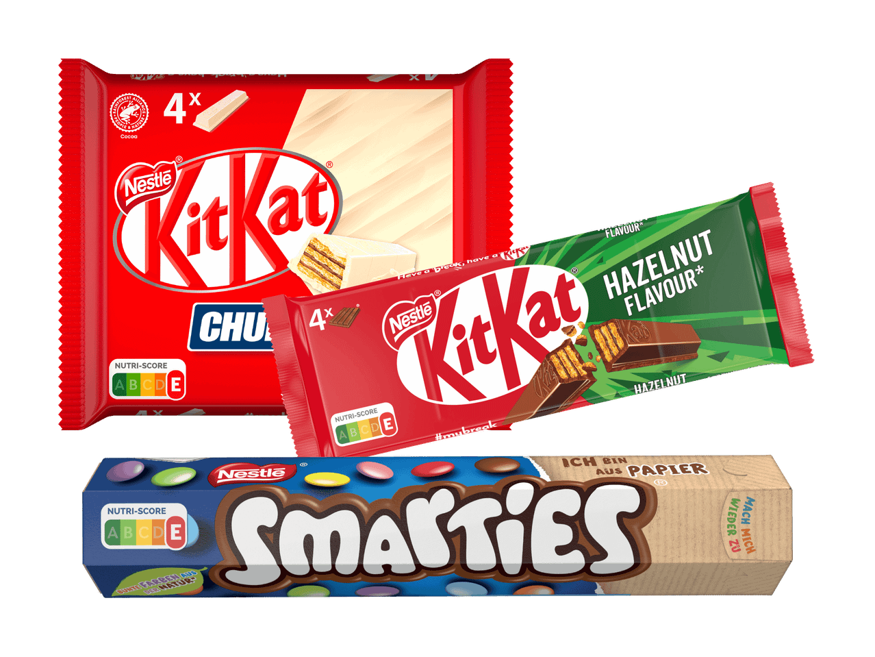 Drei KitKat- und Smarties-Produkte, darunter eine weiße Schokolade KitKat Chunky und eine Haselnuss KitKat.