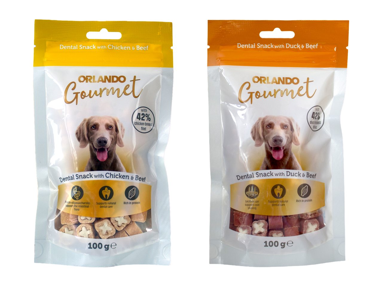 Două pungi de gustări dentare pentru câini, una cu pui și vită, cealaltă cu rață și vită.