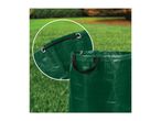 Close-up of a green garden waste bag with a black drawstring and carrying handle.