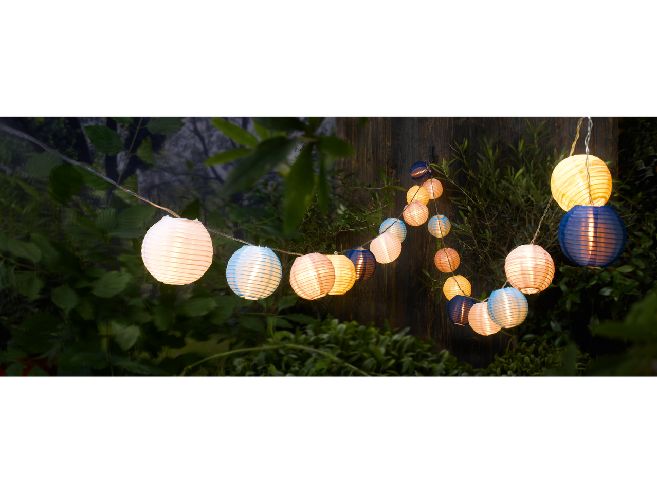 Colorful paper lanterns with LED lights for outdoor use.
