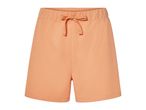 Peach-colored drawstring shorts.