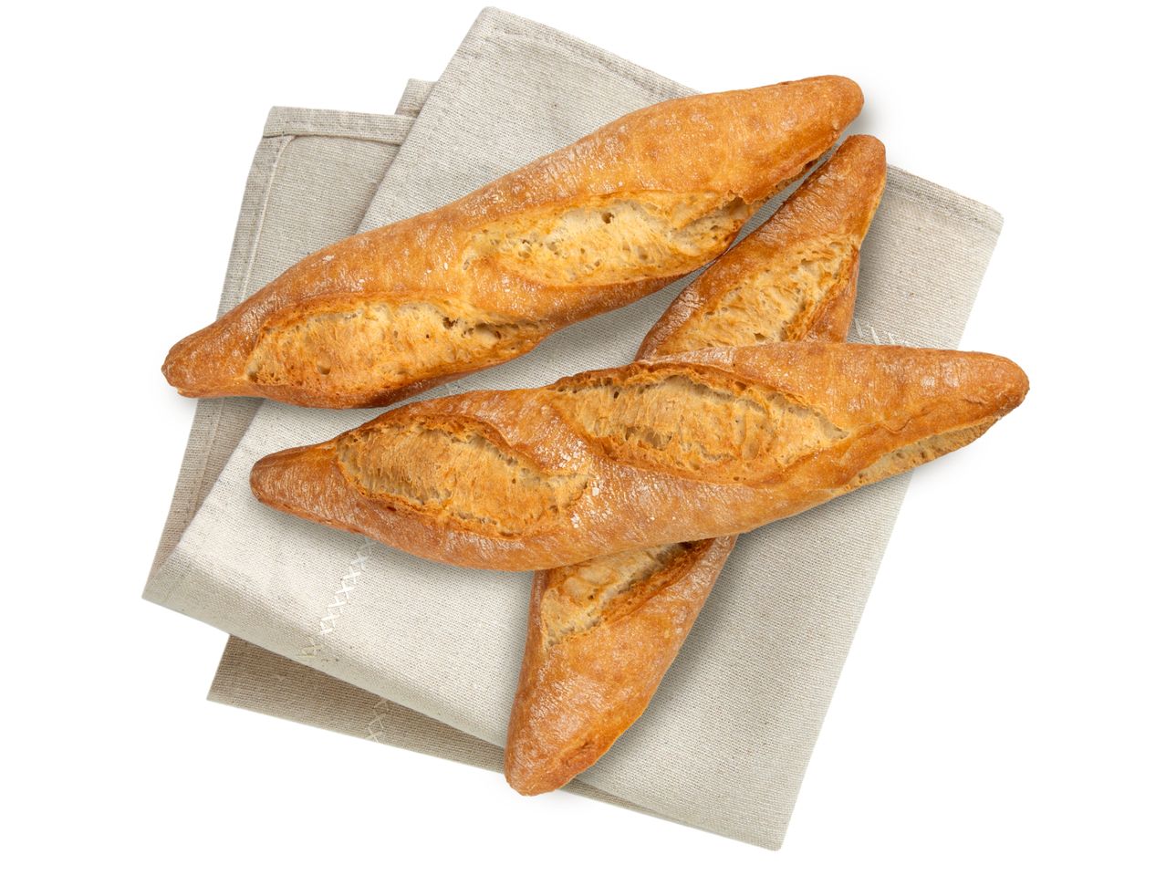 Frische Baguettes auf einem Leinen-Tischtuch.