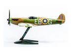 A model airplane, a fighter jet, in green and brown camouflage with the letters 'EBOG' and 'P7350' on its side, displayed on a stand.