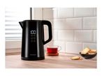 Black kettle with digital display showing 100 degrees, next to a cup of tea and biscuits.