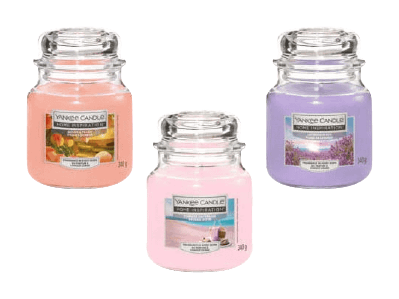 Drei Duftkerzen im Glas: goldener Pfirsich, Lavendel und Erdbeer-Cupcake.