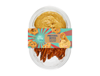 Pretzel bites with nacho cheese dip in a clear plastic container, with a colorful label.
