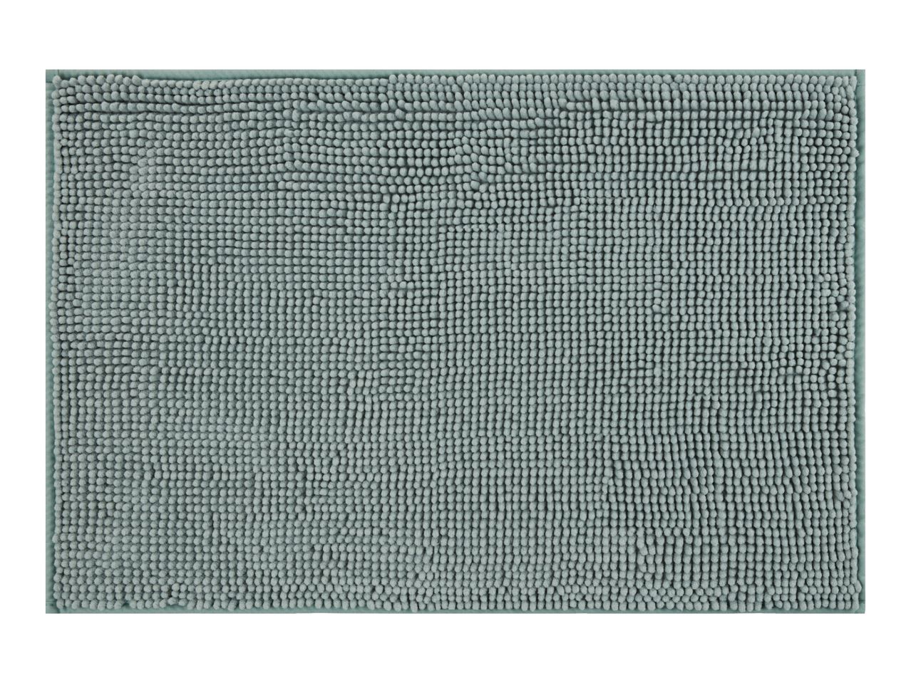 Close-up of a light green bath mat with a textured, bobble surface
