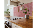 LIVARNO home self-adhesive wall tiles in a kitchen with a wooden countertop.