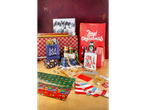 Christmas gift wrapping supplies, including gift bags, wrapping paper, ribbons, bows, and gift tags.