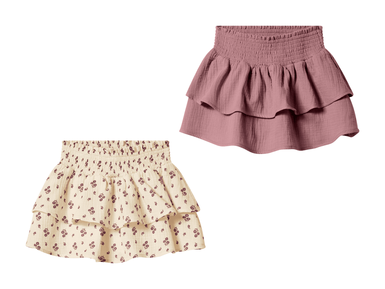 Zwei Kinder-Rüschenröcke, einer in Unifarben Rosa und einer in Beige mit Blumenmuster.
