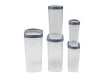 Set of four clear plastic storage containers with gray lids.