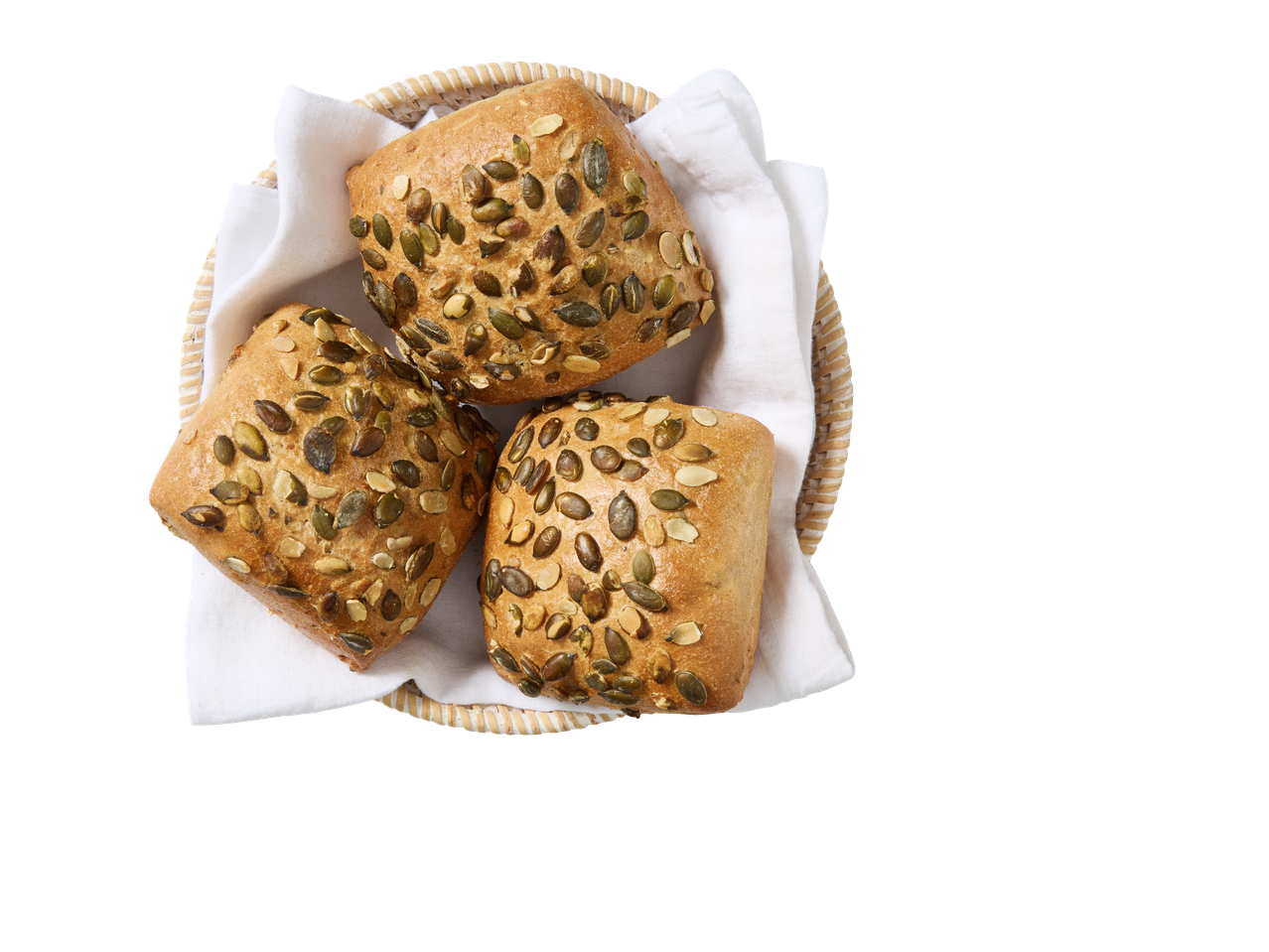 Drie pompoenpit Berliner broodjes in een mand met een witte doek.
