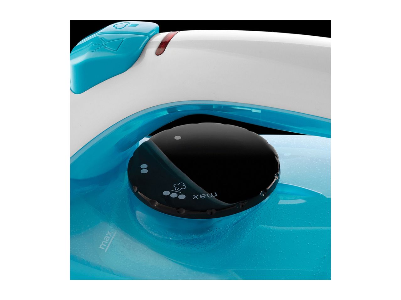 Close-up of a blue and white steam iron with a black dial