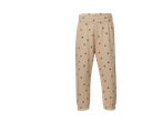 Beige LUPILU babybroek met zwarte stippen.