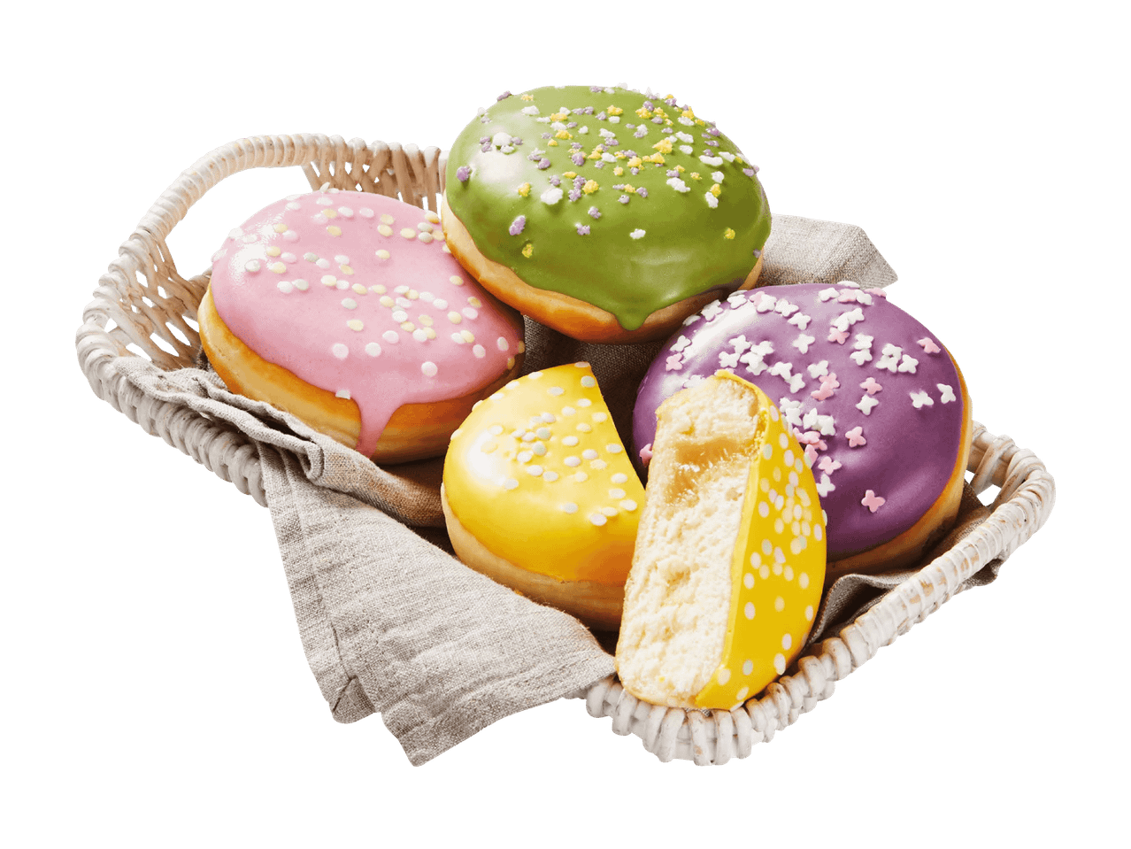 Bunte Donuts mit Zuckerguss und Streuseln in einem Weidenkorb, einer davon angeschnitten.