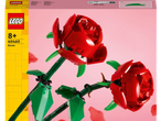 Confezione LEGO Roses 40460 con due rose rosse costruite con mattoncini su sfondo rosa.