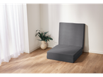 Grey foldable mattress on a light wood floor.